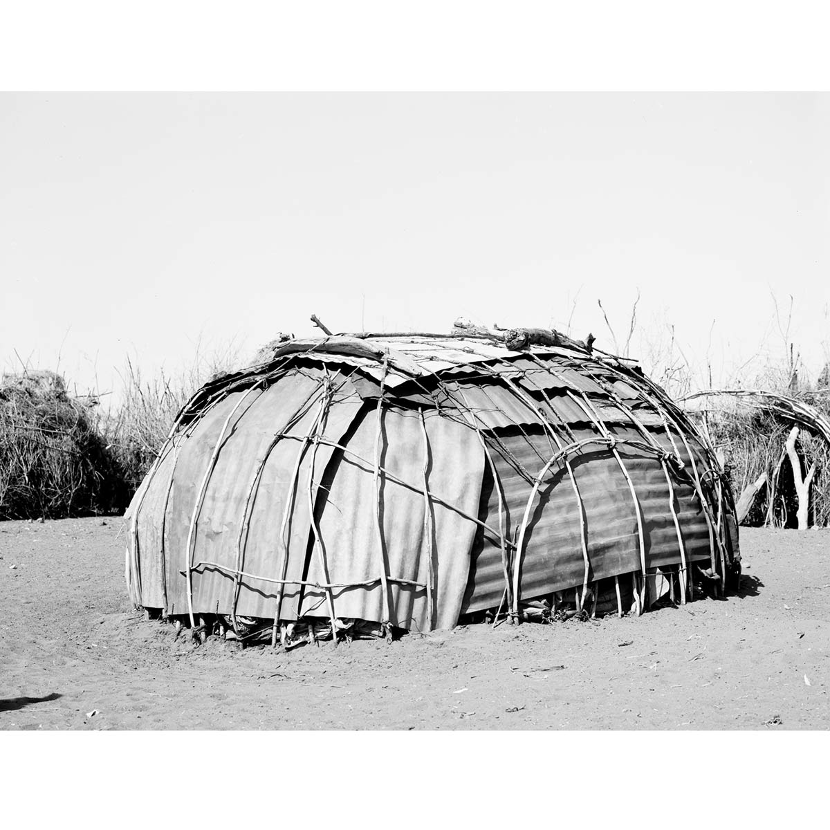 Winfried Bullinger - Dassanech Hut Fitted with Corrugated Iron Sheets